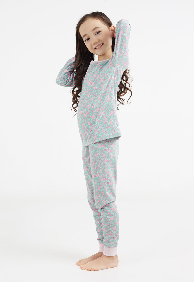 Model wears Girls Long Sleeve Ditsy Floral PJ Set by Gen Woo.