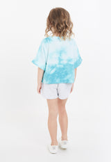 Girls T-shirt by Gen Woo. Our blue sausage dyed t-shirt features a comfortable and loose fit. Please note that each tie dye piece is 100% unique. – Back view