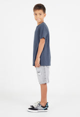Side view as the young boy wears the Boys Classic Crew Neck Navy T-Shirt by Gen Woo