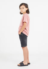 Side view as the young boy wears the Boys Classic Crew Neck Salmon T-Shirt by Gen Woo