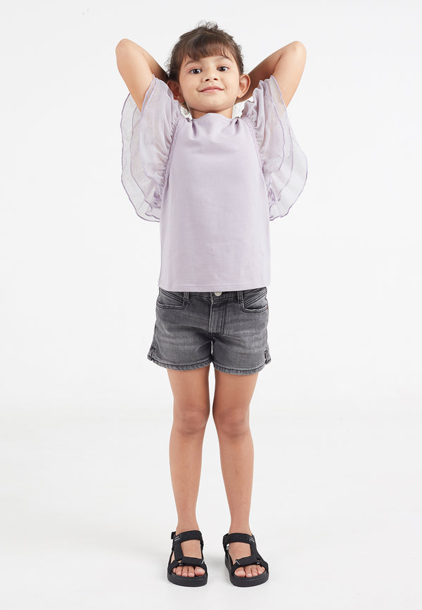 Model poses in Girls Lavender Tulle Sleeve T-Shirt by Gen Woo.