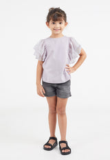 Model wears Girls Lavender Frill Sleeve T-Shirt by Gen Woo.