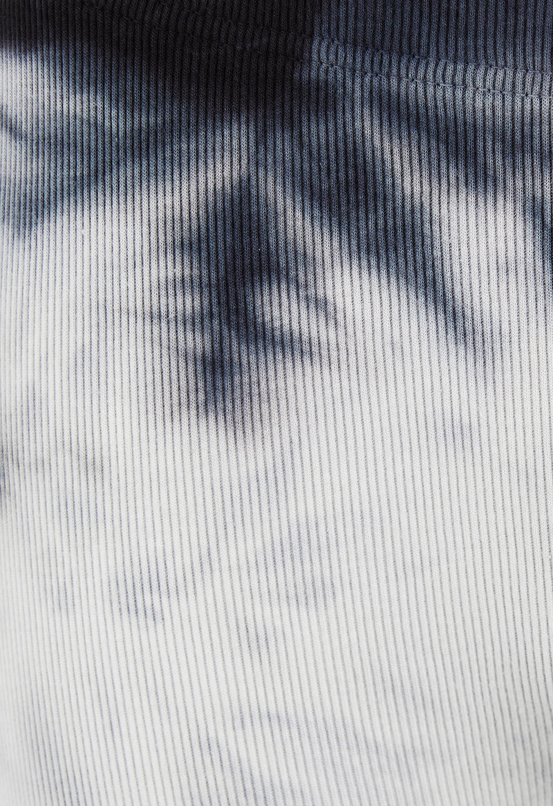 Close-up of the Black and White Tie-Dye Ribbed Girls Leggings by Gen Woo