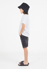 Side view as the young boy wears the Boys Classic Crew Neck White T-Shirt by Gen Woo