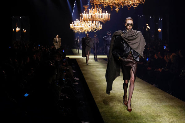 Fashion Week Paris 2023. Back to the 80s, as models walk the runway at Yves Saint Laurent Fall 2023. Photo by Ik Aldama via Getty Images.