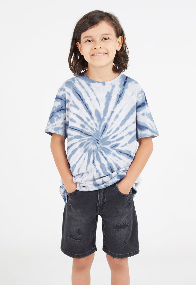 Boys T-shirt by Gen Woo. Our crew neck tie dye t-shirt features 1x1 rib neck binding along with twin needle stich finish at hem. The navy tie dye design t-shirt has a standard length and body fit. Please note that each tie dye piece is 100% unique. – Close up view