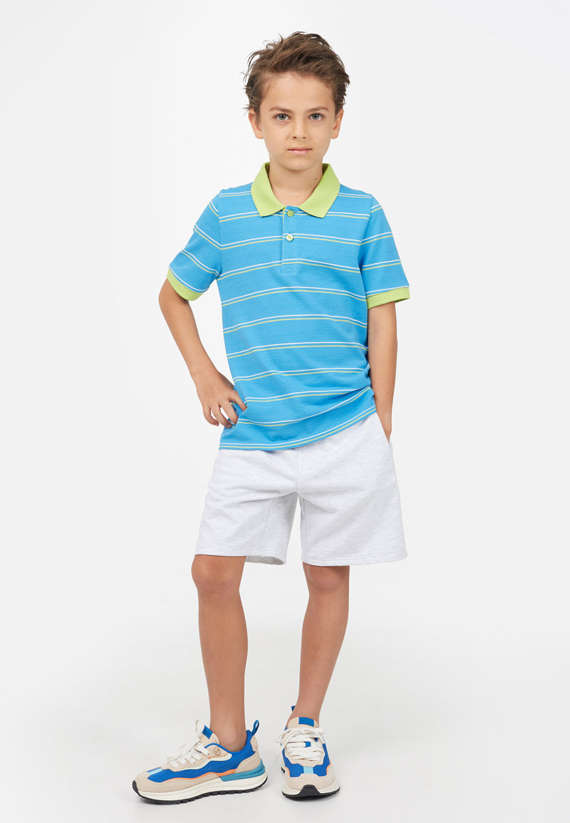 Model wears colour-contrast Blue Striped Boys Polo T-Shirt by Gen Woo.