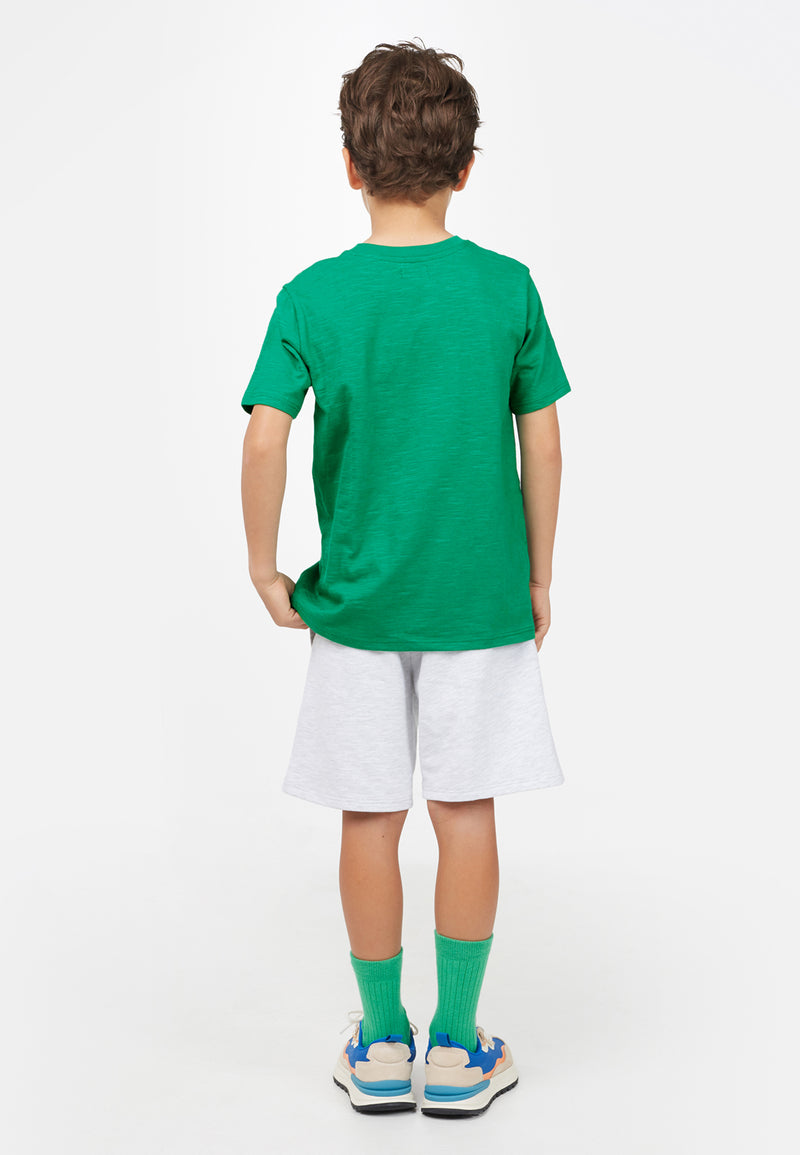 Back view of model wearing Emerald Boys Crew Neck T-Shirt by Gen Woo. 