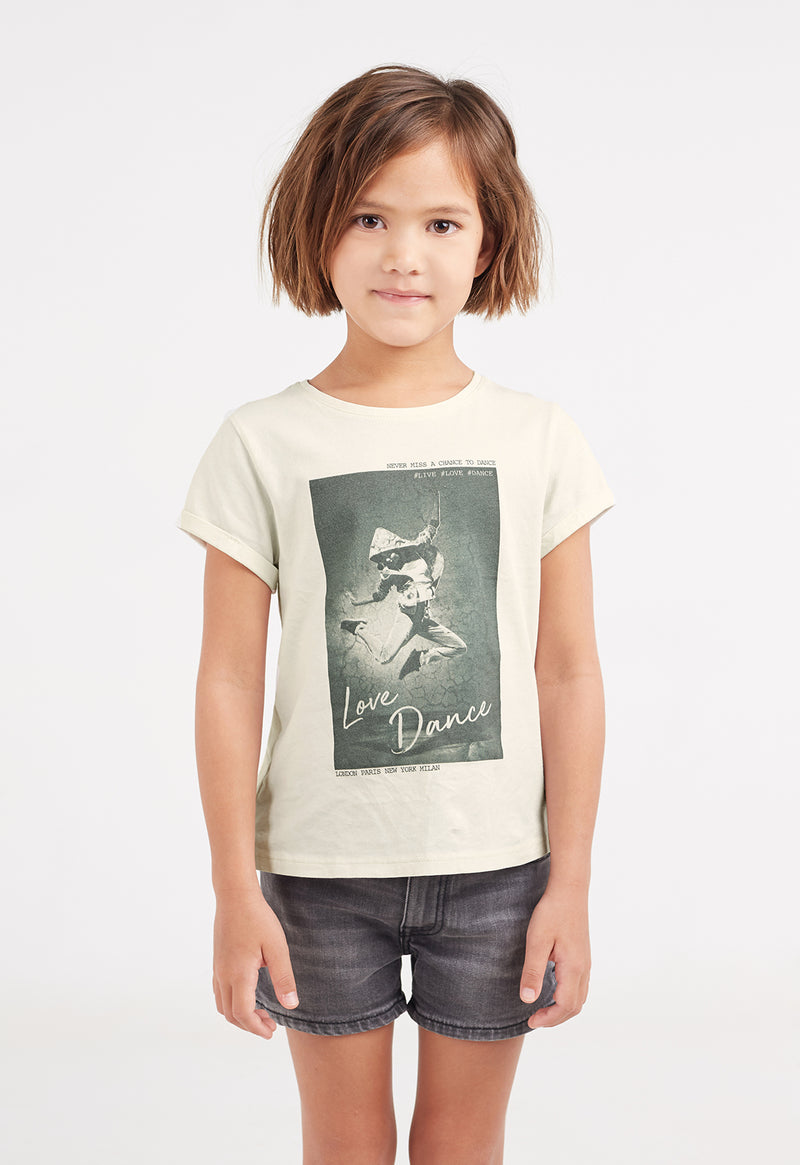 A close-up of the young girl wearing the “Love Dance” Girls Digital Print T-Shirt by Gen Woo