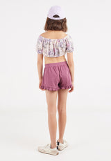 Back view of the teen girl wearing the Damson Cotton Peplum Frill Girls Shorts by Gen Woo
