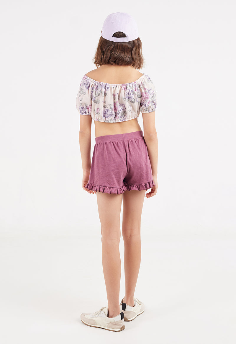Back view of the teen girl wearing the Damson Cotton Peplum Frill Girls Shorts by Gen Woo