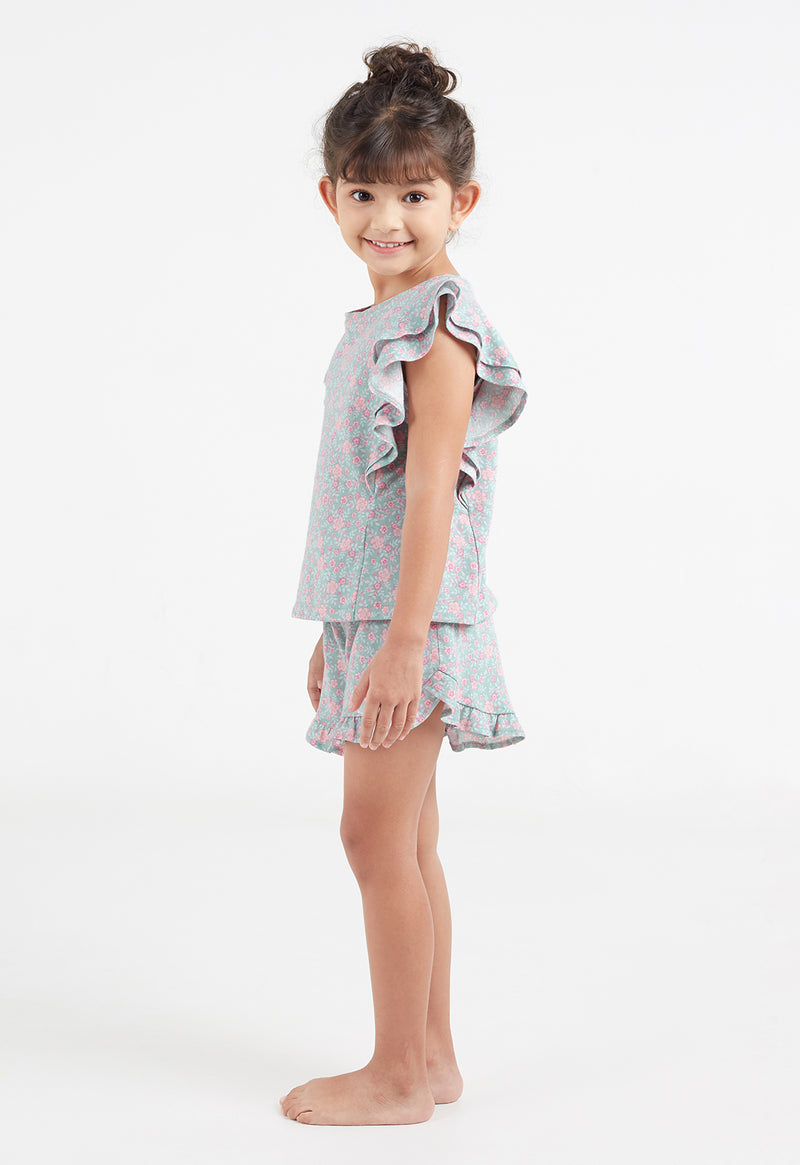 Side view of Girls Short Ditsy Floral PJ Set by Gen Woo.