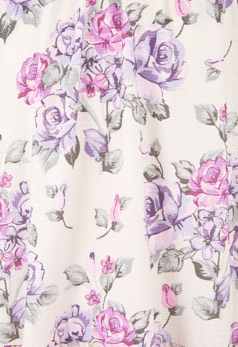 Close-up of the Pink and Purple Floral Bloom Tiered Girls Dress by Gen Woo
