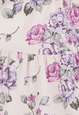 Close-up of the Pink and Purple Floral Bloom Girls Smock Top by Gen Woo
