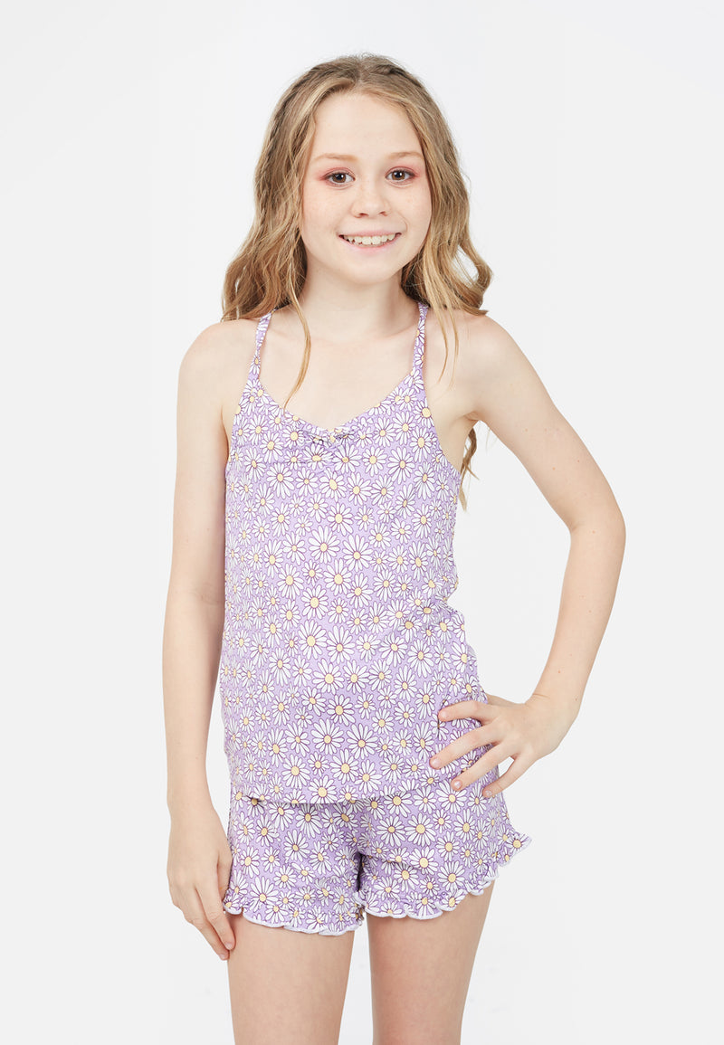 Model wears short Daisy Print Girls Cami Pyjama Set by Gen Woo. 