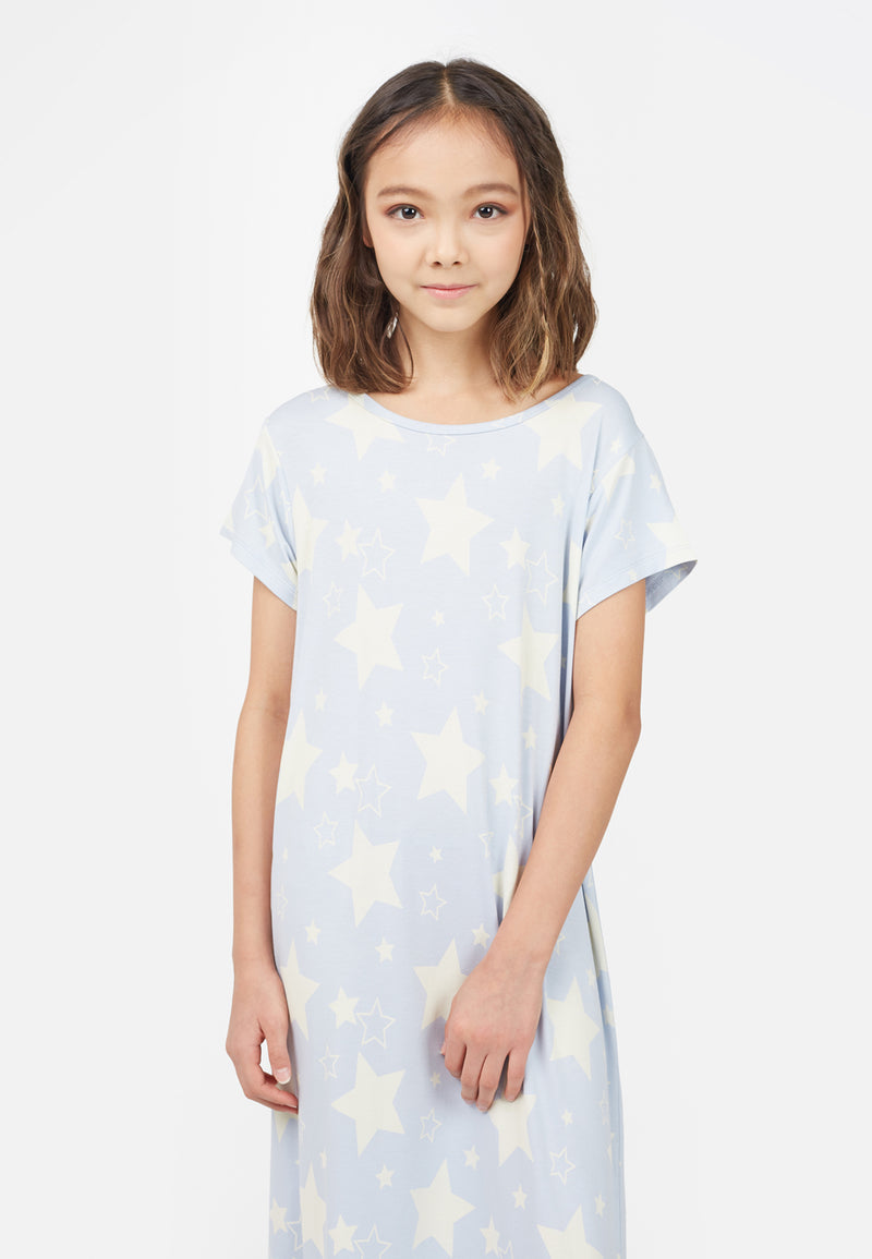 Model wears Star Print Girls Oversized Nightdress by Gen Woo. 