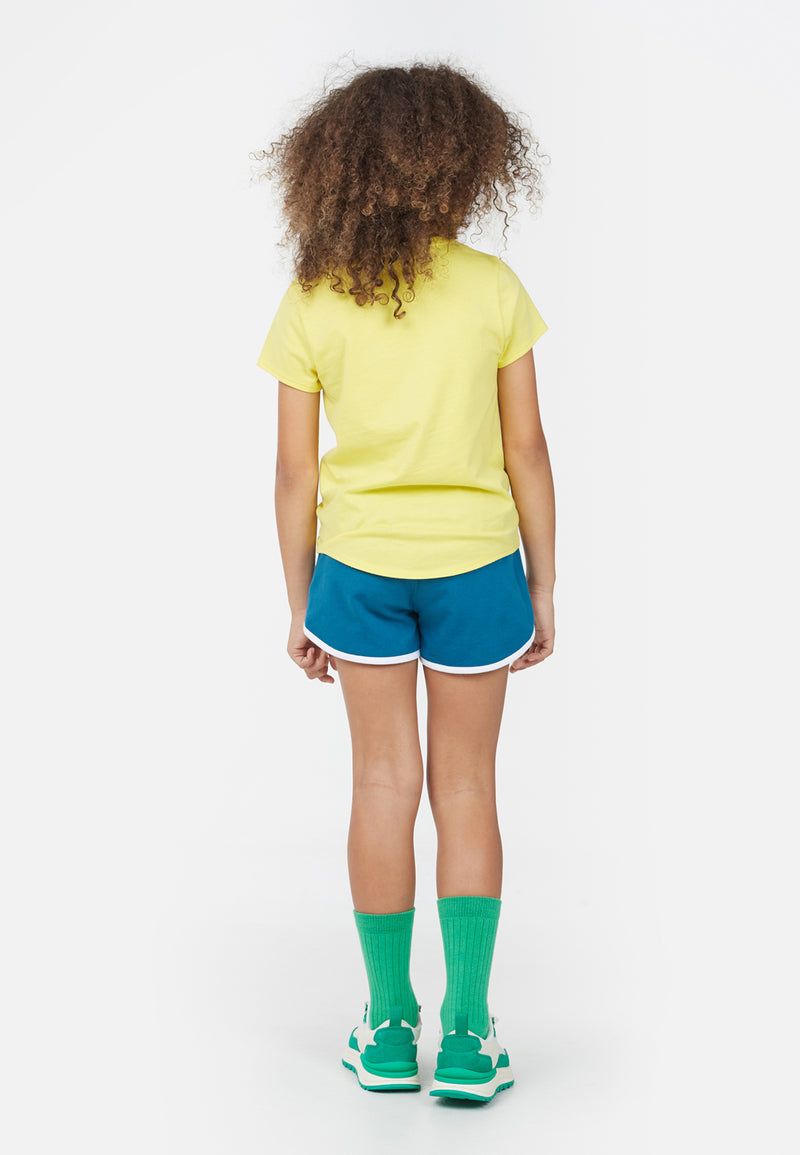 Back view of model wearing Sunshine Yellow Embroidered Girls T-Shirt by Gen Woo. 