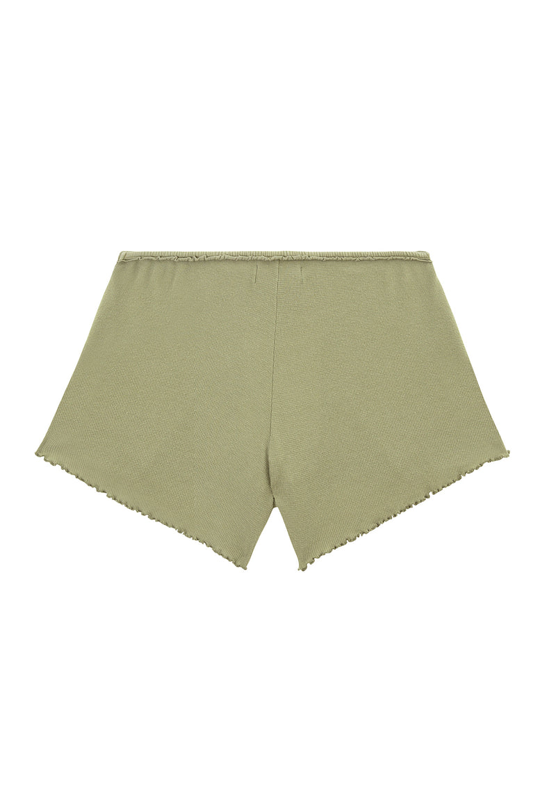 Ladies Shorts by Gen Woo. Our loose knit lounge shorts is high rise with elasticated waist. The green washed out shorts is suitable for home loungewear or nightwear. Please note that each washed out garment will have colour shade variation. –Back view