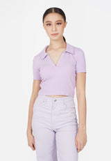 (Close up) Model wears Ladies Purple Cropped Polo T-Shirt by Gen Woo.