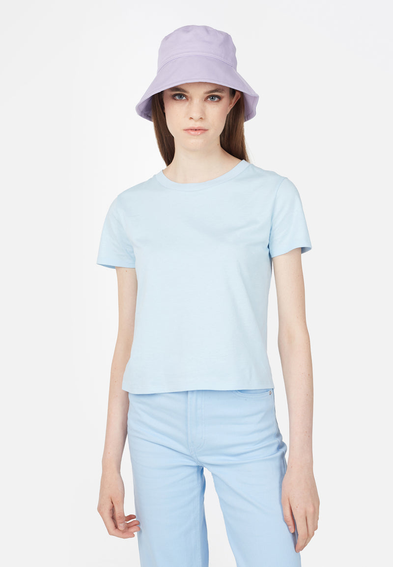 (Close up) Model wears Basic Pastel Blue Ladies T-Shirt by Gen Woo. 