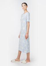 Model wears blue and white Star Print Ladies Oversized Nightdress by Gen Woo. 