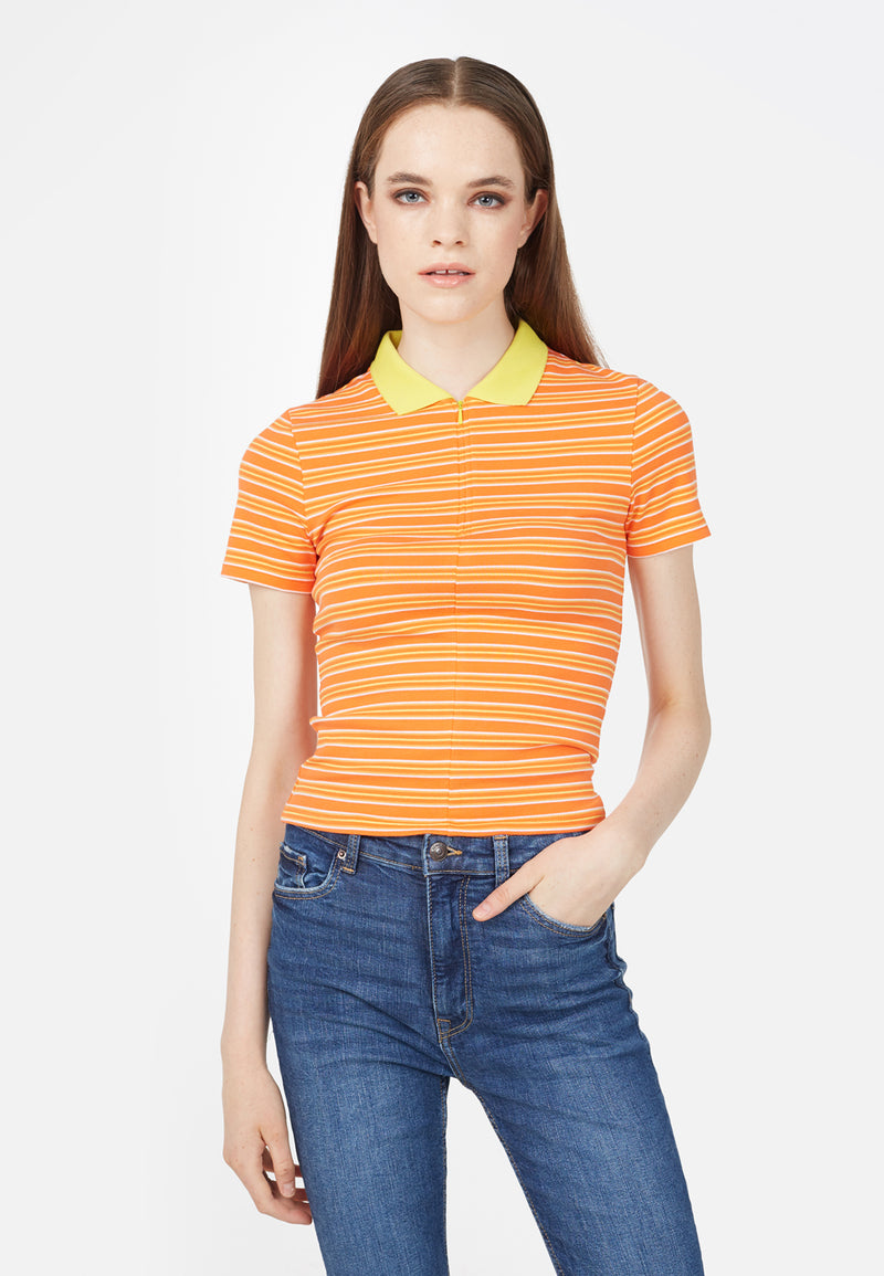 Close-up of the model wearing the Orange and Yellow Retro Striped Ladies Polo T-Shirt by Gen Woo