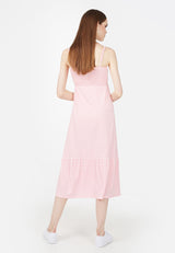 Back view of the model in the Pink Gingham Ladies Maxi Dress by Gen Woo