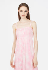 Close-up of the model in the Pink Gingham Ladies Maxi Dress by Gen Woo