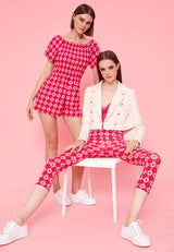 Model on the right wears the Cropped Tailored Ladies Blazer in sheer pink by Gen Woo