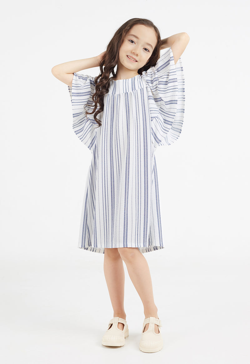 A young girl poses wearing the Girls Striped Flutter Sleeve A-Line Dress by Gen Woo