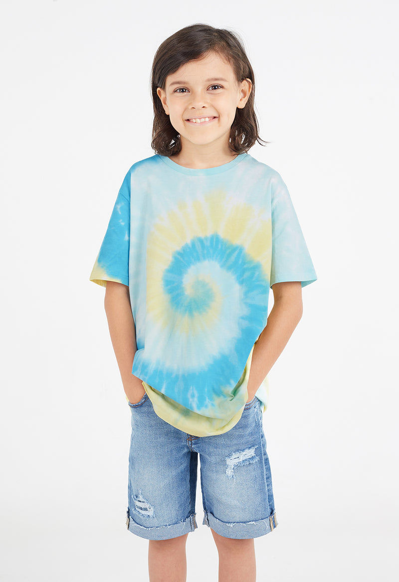 Close-up as the young boy wears the Boys Blue and Yellow Spiral Tie-Dye T-Shirt by Gen Woo 