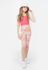 The teen girl wears the Retro Floral Cropped Leggings by Gen Woo
