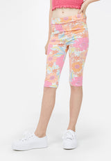Close up as the teen girl wears the Retro Floral Cropped Leggings by Gen Woo