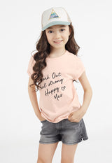 The young girl poses in the “Work Out, Feel Strong, Happy, Yes”  Girls Slogan T-Shirt by Gen Woo and denim shorts