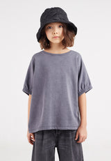 The young girl models the Washed Grey Boxy Girls Sweater T-Shirt by Gen Woo