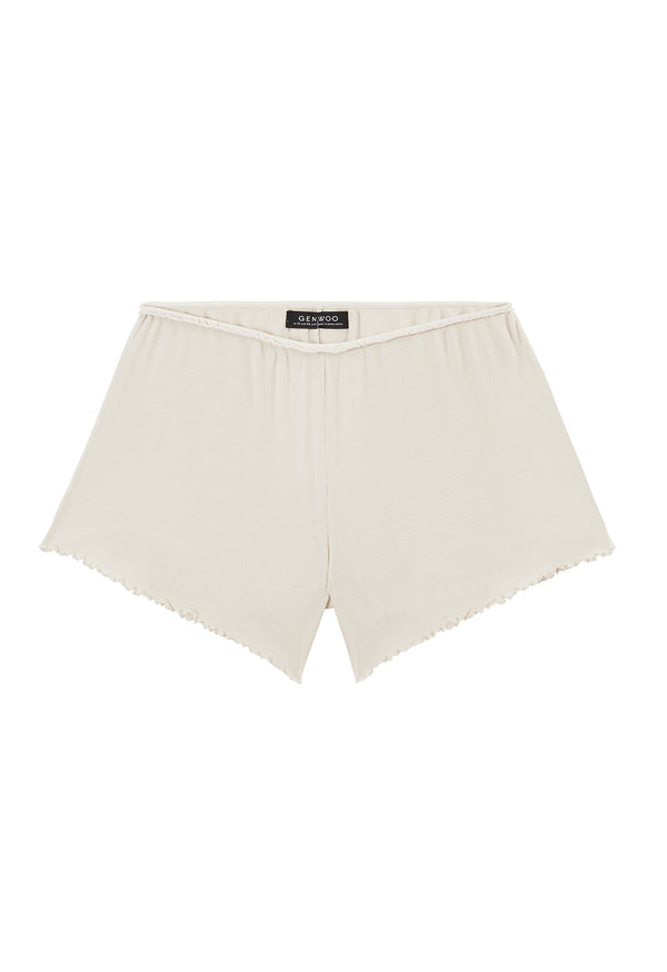 Ladies Shorts by Gen Woo. Our loose knit lounge shorts is high rise with elasticated waist. The white washed out shorts is suitable for home loungewear or nightwear. Please note that each washed out garment will have colour shade variation. –Front view