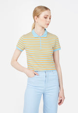 The model poses in the Blue and Orange Retro Striped Ladies Polo T-Shirt by Gen Woo