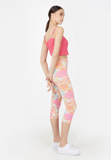 Side profile of the model wearing the Retro Floral Cropped Ladies Leggings by Gen Woo