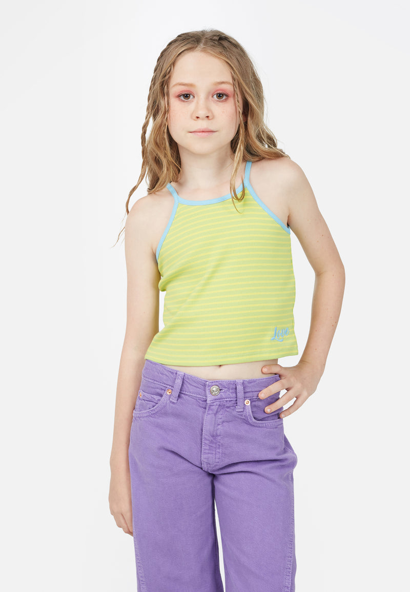 Model wears cropped Teen Lime Contrast Spaghetti Vest by Gen Woo. 