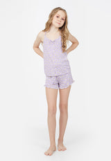 Model wears Daisy Print Girls Cami Pyjama Set by Gen Woo. 