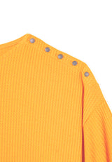 Close up view of Ladies Ochre Waffle Detail Top by Gen Woo.