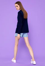 Back view of the model in the Double-Breast Oversized Ladies Blazer in navy by Gen Woo